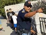 Cop Threatens Kids With His Gun Making An Arrest

