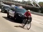 Cops Attempt To Bring In A Cyclist
