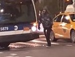 Crazy Guy Attacks A Bus Because Why The Hell Not
