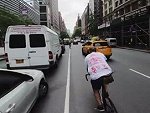 Cyclist Fearlessly Peddles Around The Streets Of NYC
