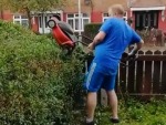 Dad Found A Faster Way To Trim The Hedge
