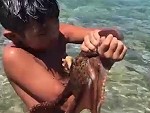 Dad Teaches His Son How To Catch An Octopus
