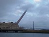 Demolished Smoke Stack Falls Gracefully From Up In The Clouds