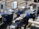 Dog Makes A Break Through Security
