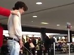 Drunk Guy Openly Takes A Piss In The Airport Lounge
