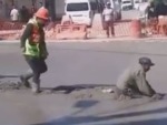 Drunk Guy Trashes A Freshly Poured Road

