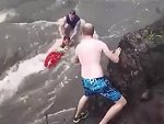 Dumbarse Tourists Washed Over A Waterfall
