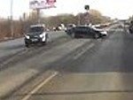 Dumbass Gets His Car Crunched By A Truck
