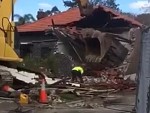 Excavator Bucket Very Nearly Kills The Labourer
