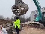 Excavator Steals A Guys Hat
