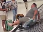 Fat Guy On The Baggage Carousel
