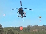 Fire Fighting Helicopters Lining Up To Refill
