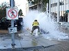 Firemen Take A Bath Shutting Down A Busted Main