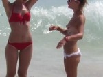 Flaunting It Topless At The Beach
