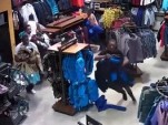 Group Of Guys Ransack A Clothing Store
