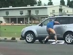 Guy Being Dragged Somewhat Naked Down The Street

