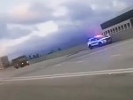 Guy Gets Over Excited Watching A Police Chase
