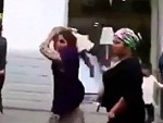 Gypsy Woman Tries To Hit A Man With A Little Kid
