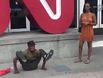 Homeless Guy Puts On A Shoe For The Pretty Lady
