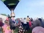 Hot Air Balloon Drops In To A Festival
