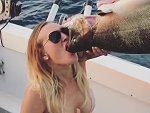 Hot Chick Down A Beer Using A Fish
