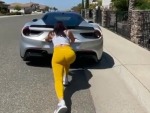 Just A Hot Girl Pushing Her Ferrari
