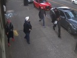 Laundromat Robber Is Shown The Window
