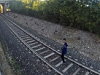 Laying On The Tracks Under A Train