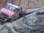 Logger Isn't Fazed By A Little Mud
