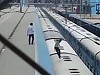 Moron Experiences A Kajillion Volts Atop A Train
