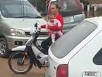 Motorbike Mama Demonstrates How Not To Transport Your Baby
