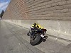 Motorbiker Badly Attempts A Highway Mono