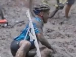 Mountain Biker Goes In The Mud
