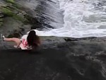 Mum Laughs As Her Daughter Slips Into The Ocean
