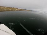 Nervously Watching The Iced Lake Crack As They Drive Over It
