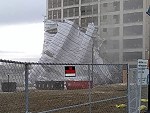 Nine Story Scaffolding Folds In Strong Winds
