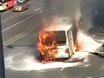 Packed Bus Goes Up In Flames On A Busy City Street
