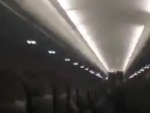Passengers Shit As Plane Hits A Hail Storm
