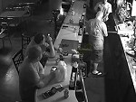 Patron Completely Unfazed Whilst The Bar Is Robbed
