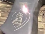 Pistol Grip Being Etched By Laser
