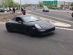 Porsche Numpty Just Embarrasses Himself
