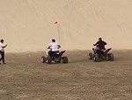 Quad Biker Gets Utterly Creamed On The Dunes
