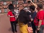 Queens Guard Pushes A Dumb Tourist Out Of The Way
