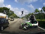 Rider Inexplicably Fails To Notice A Broken Down Car
