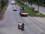 Riders Collide And One Is Slung Under A Trucks Backend
