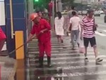 Road Worker Is Very Busy Shovelling Puddles
