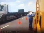 Roadworker Somehow Avoids Death
