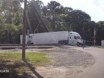Semi-Truck Managed To Break Down Right On A Level Crossing
