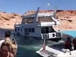 Sinking House Boat Makes A Dash For Land
