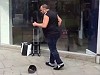 Street Performer Has No Talent But Deserves A Tip
